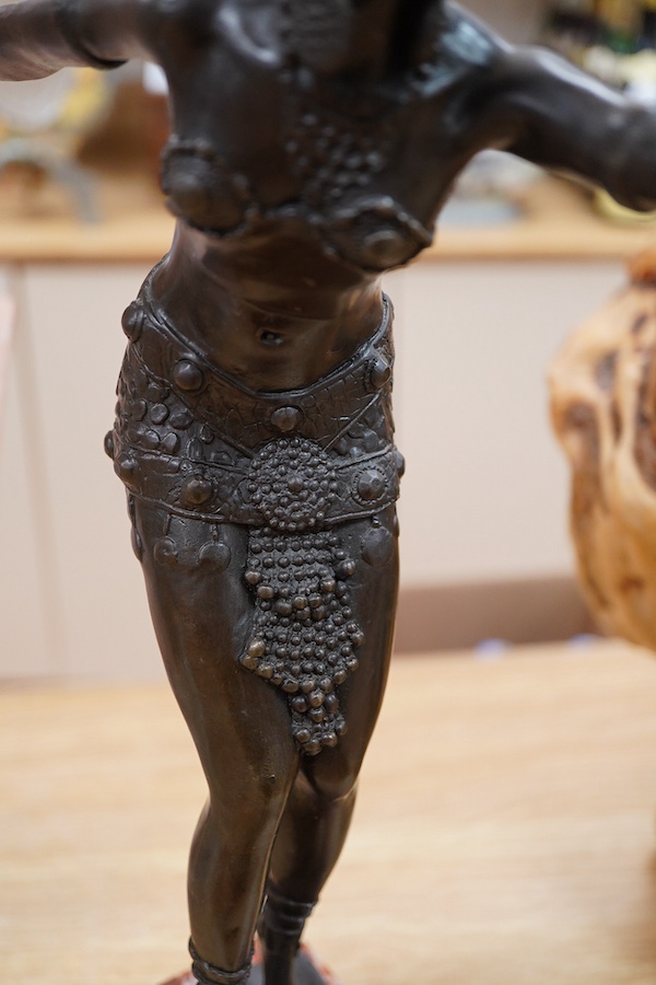 After Demétre Haralamb Chiparus (1886–1947), an Art Deco style bronze of a dancing lady, raised on stepped marble base, 48cm high